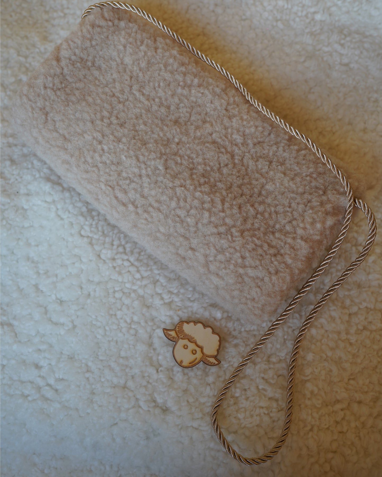 Wollbebi Muff "Ted" aus Schurwolle beige
